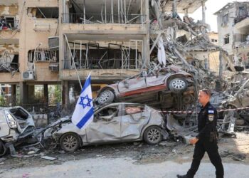 Israel’s Defense Minister Threatens Iran Amid Missile Attacks